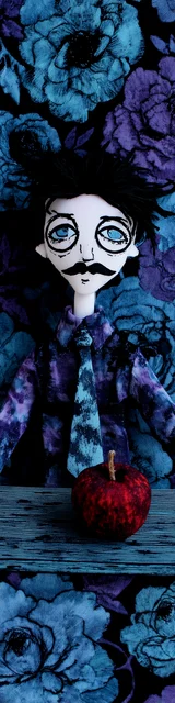 Free teacher bookmark featuring a teacher with blue flowers and an apple